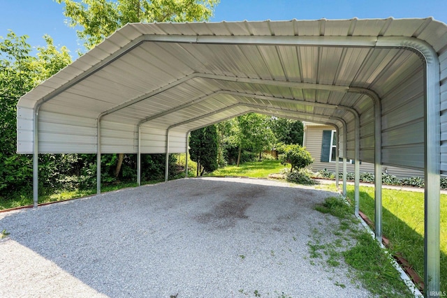 3610 E Sherwood Ter, Fort Wayne, IN 46806 - view of parking / parking lot with a carport