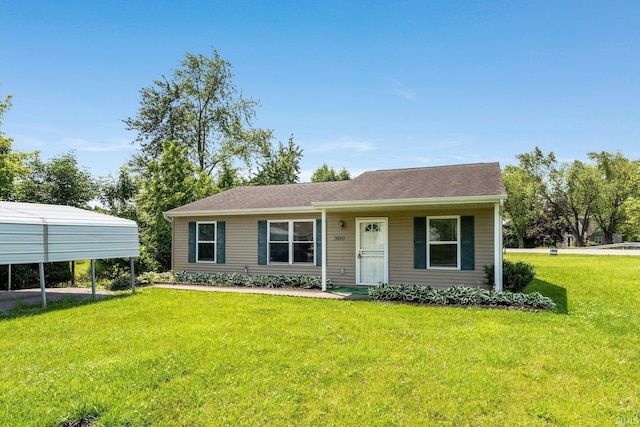 3610 E Sherwood Ter, Fort Wayne, IN 46806 - ranch-style house with a front yard and a detached carport