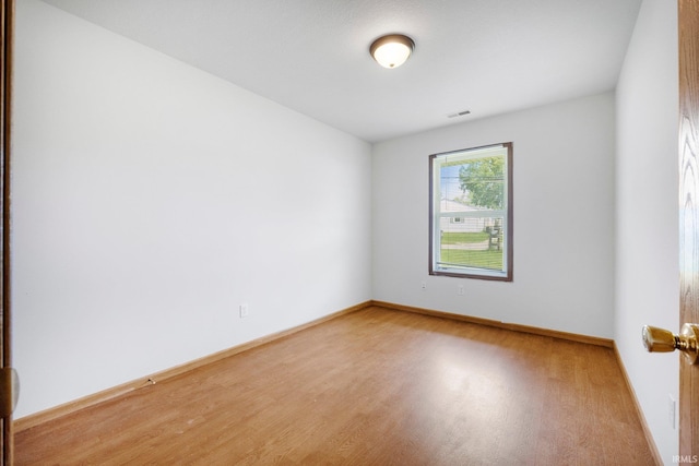 3610 E Sherwood Ter, Fort Wayne, IN 46806 - unfurnished room featuring light wood finished floors and baseboards