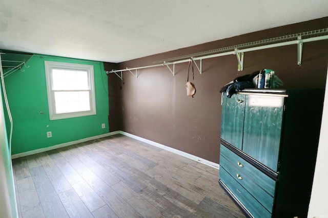 2907 Prairie Ln, Lafayette, IN 47904 - walk in closet with wood finished floors