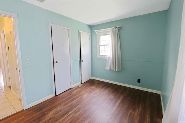 2907 Prairie Ln, Lafayette, IN 47904 - unfurnished bedroom featuring wood finished floors