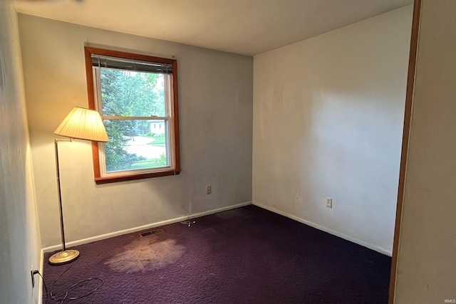 615 Springbrook Rd, Fort Wayne, IN 46825 - empty room with dark carpet and baseboards