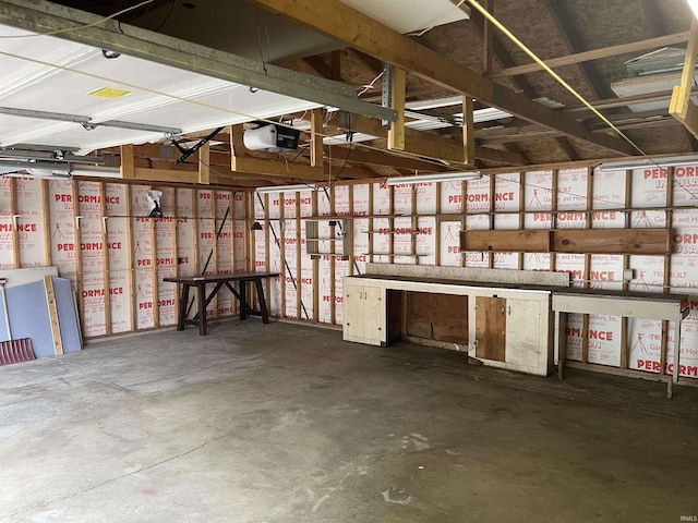 210 Gladstone Dr, Wabash, IN 46992 - garage featuring a workshop area and a garage door opener
