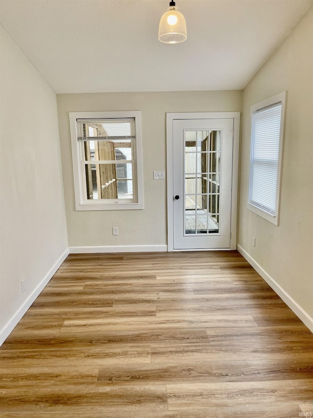 210 Gladstone Dr, Wabash, IN 46992 - unfurnished room featuring baseboards and light wood-style floors