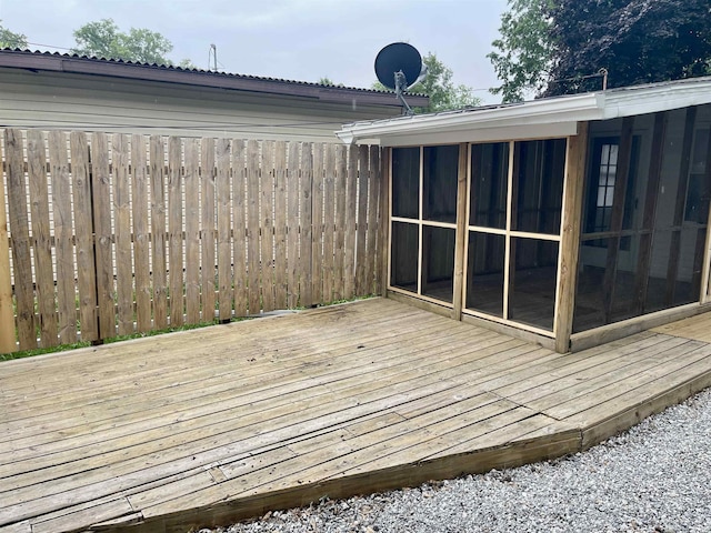 210 Gladstone Dr, Wabash, IN 46992 - wooden deck with a sunroom