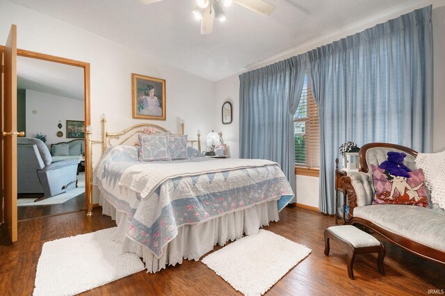 205 Par Blvd, Bristol, IN 46507 - bedroom with wood finished floors, vaulted ceiling, and a ceiling fan
