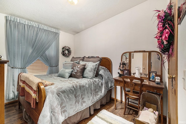 205 Par Blvd, Bristol, IN 46507 - bedroom with wood finished floors and a textured ceiling
