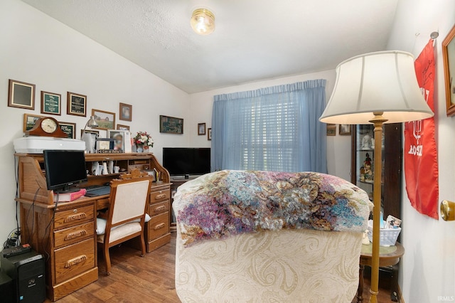 205 Par Blvd, Bristol, IN 46507 - bedroom featuring vaulted ceiling, wood finished floors, and an office area