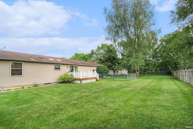 205 Par Blvd, Bristol, IN 46507 - fenced backyard with a wooden deck