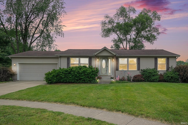 205 Par Blvd, Bristol, IN 46507 - ranch-style house with concrete driveway, a garage, and a lawn