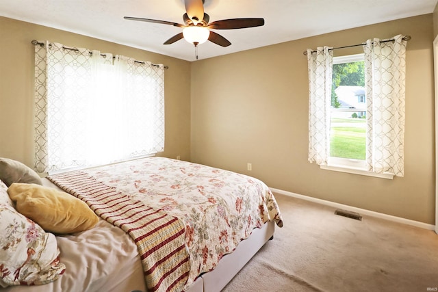 3847 Lodi Ln, Lafayette, IN 47905 - carpeted bedroom with baseboards and a ceiling fan