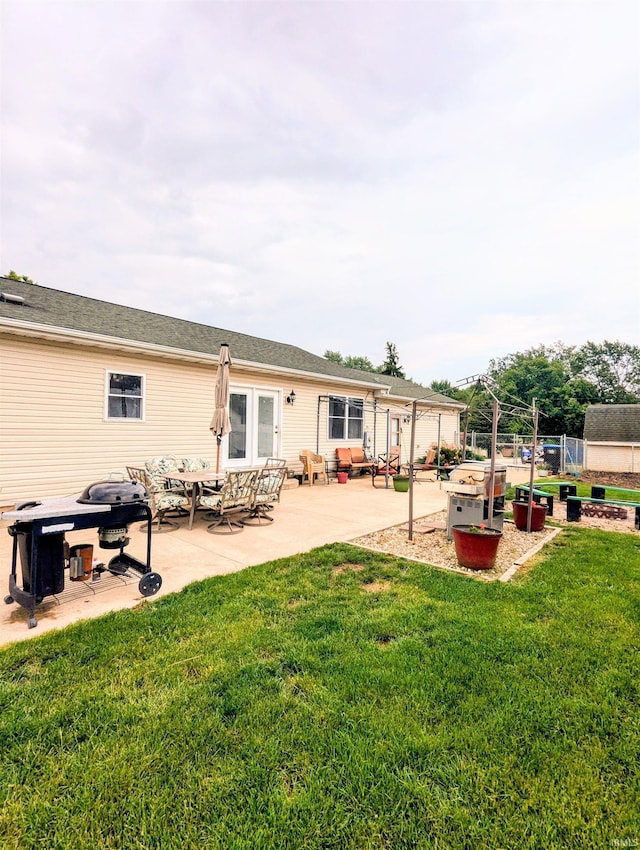 11497 N Biscayne Ln, Cromwell, IN 46732 - back of house with a garden and a patio