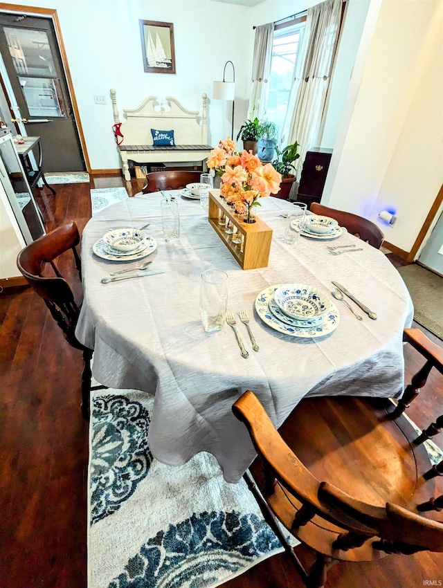 11497 N Biscayne Ln, Cromwell, IN 46732 - dining room featuring baseboards and wood finished floors
