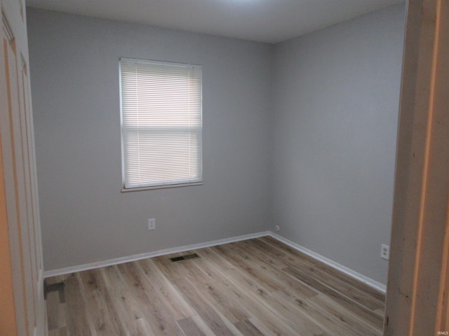 2305 Hillis Ct, Kokomo, IN 46902 - spare room featuring light wood finished floors and healthy amount of natural light