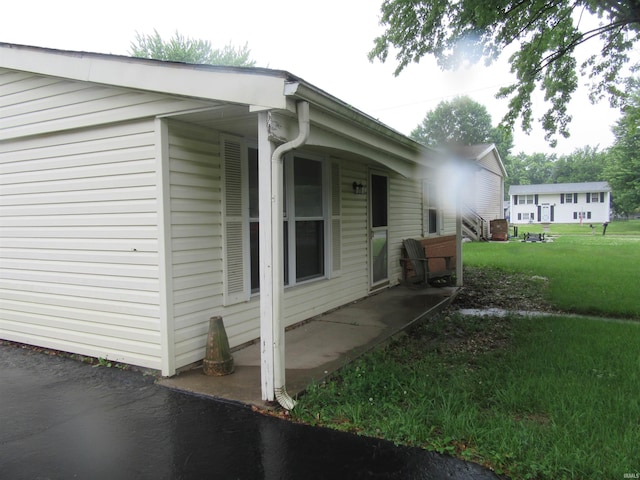 2305 Hillis Ct, Kokomo, IN 46902 - view of side of property with a yard and a patio area