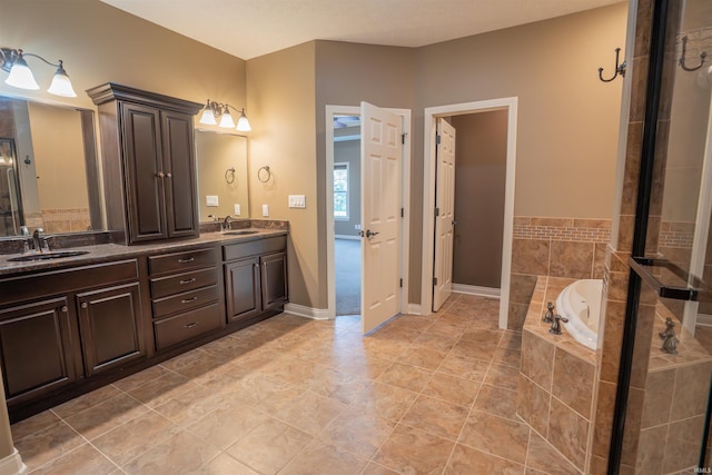 3507 Wakefield Dr, West Lafayette, IN 47906 - full bath featuring a garden tub, double vanity, tiled shower, and tile patterned floors