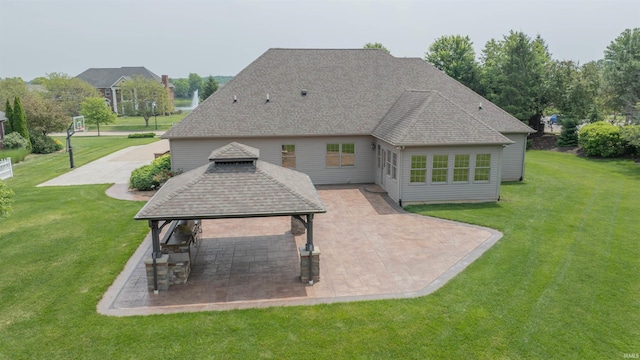 3507 Wakefield Dr, West Lafayette, IN 47906 - back of house featuring a gazebo, a lawn, a patio, and roof with shingles