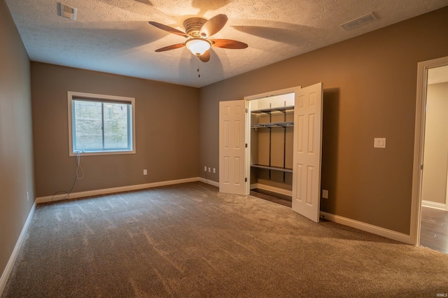 3507 Wakefield Dr, West Lafayette, IN 47906 - unfurnished bedroom featuring carpet, a textured ceiling, and a ceiling fan
