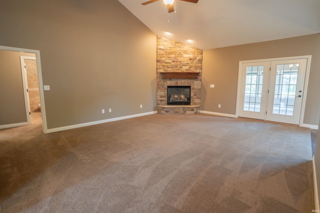 3507 Wakefield Dr, West Lafayette, IN 47906 - unfurnished living room featuring ceiling fan, carpet floors, a stone fireplace, and high vaulted ceiling