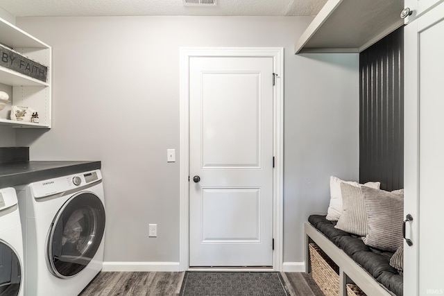 1492 Monte Carlo Dr, Huntertown, IN 46748 - laundry room with separate washer and dryer and dark wood-type flooring