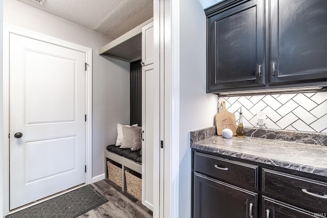 1492 Monte Carlo Dr, Huntertown, IN 46748 - mudroom featuring wood finished floors and a textured ceiling