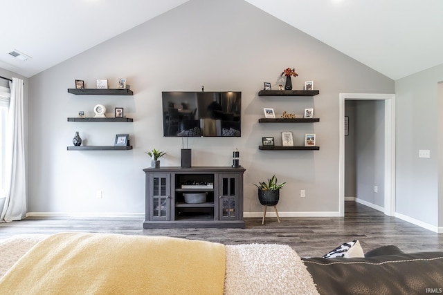 1492 Monte Carlo Dr, Huntertown, IN 46748 - living area featuring vaulted ceiling and wood finished floors