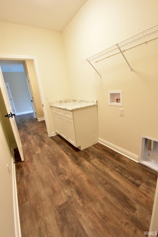 146 Hayloft Dr, West Lafayette, IN 47906 - laundry room featuring dark wood-style flooring, hookup for a washing machine, and cabinet space