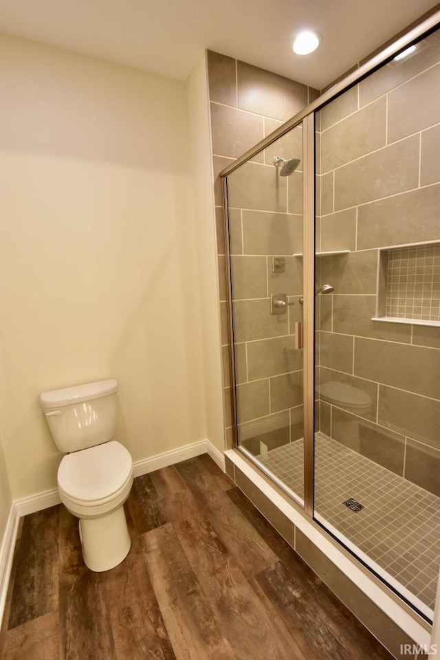 146 Hayloft Dr, West Lafayette, IN 47906 - bathroom with wood finished floors, a stall shower, and recessed lighting
