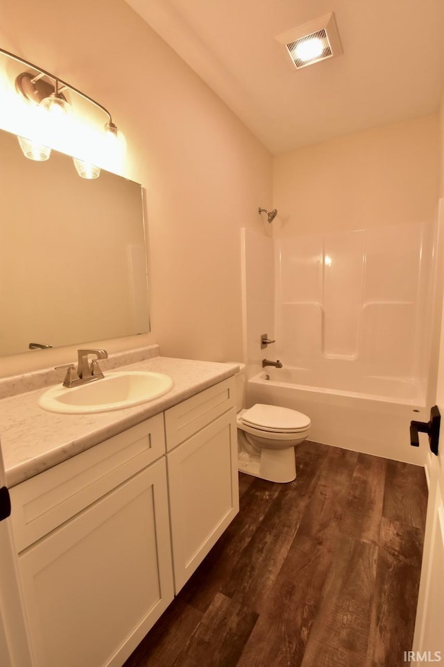 146 Hayloft Dr, West Lafayette, IN 47906 - full bathroom featuring vanity, wood finished floors, and washtub / shower combination