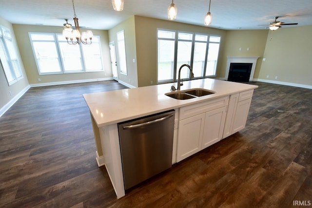 146 Hayloft Dr, West Lafayette, IN 47906 - kitchen featuring stainless steel dishwasher, open floor plan, dark wood-style floors, and a fireplace
