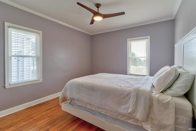 2736 Marion Ave, Evansville, IN 47712 - bedroom featuring wood finished floors, ornamental molding, and ceiling fan