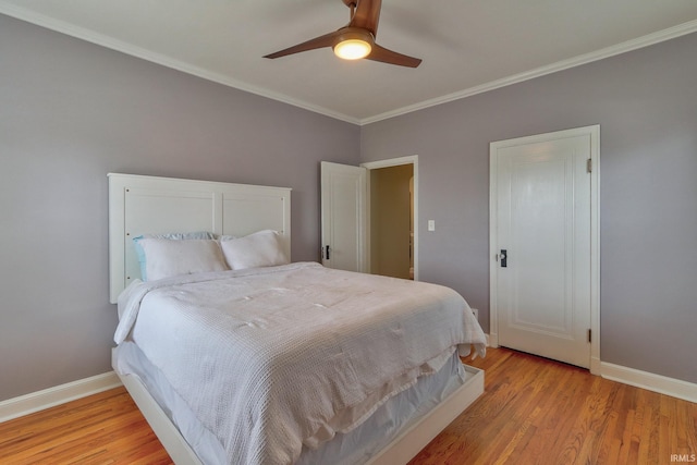 2736 Marion Ave, Evansville, IN 47712 - bedroom with light wood-style flooring, ornamental molding, and a ceiling fan