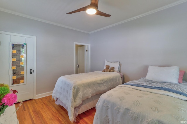 2736 Marion Ave, Evansville, IN 47712 - bedroom featuring light wood-style floors, crown molding, and ceiling fan