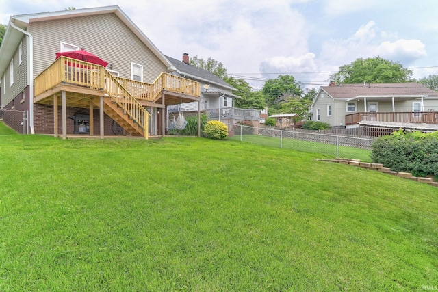 2736 Marion Ave, Evansville, IN 47712 - rear view of property featuring a fenced backyard, a deck, and stairs