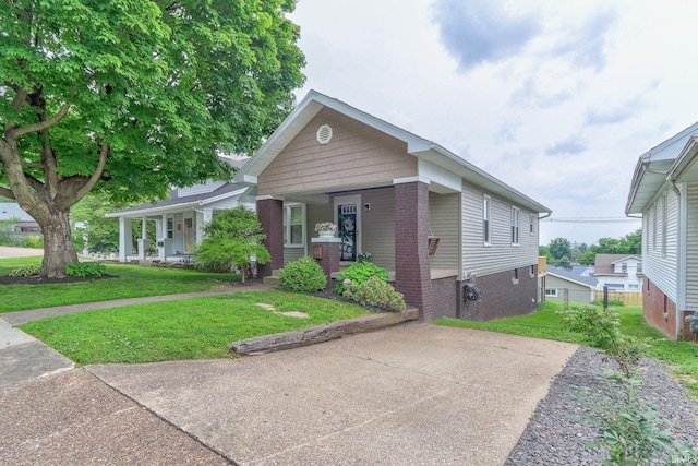 2736 Marion Ave, Evansville, IN 47712 - view of front facade with a front lawn and a porch