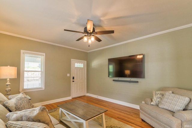 2736 Marion Ave, Evansville, IN 47712 - living room with ornamental molding, a ceiling fan, and wood finished floors
