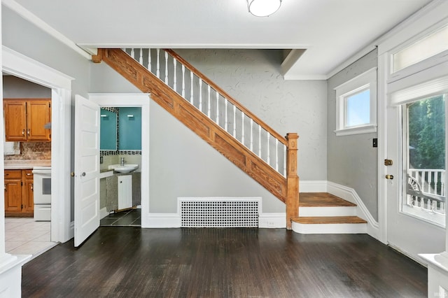 1015 Columbia Ave, Fort Wayne, IN 46805 - foyer entrance featuring stairs and wood finished floors