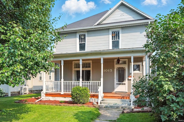 1015 Columbia Ave, Fort Wayne, IN 46805 - view of front of property with covered porch and a front yard