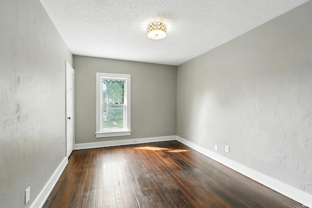 1015 Columbia Ave, Fort Wayne, IN 46805 - empty room featuring wood-type flooring and a textured ceiling