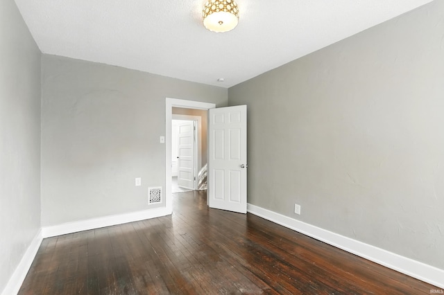 1015 Columbia Ave, Fort Wayne, IN 46805 - spare room featuring hardwood / wood-style flooring and baseboards