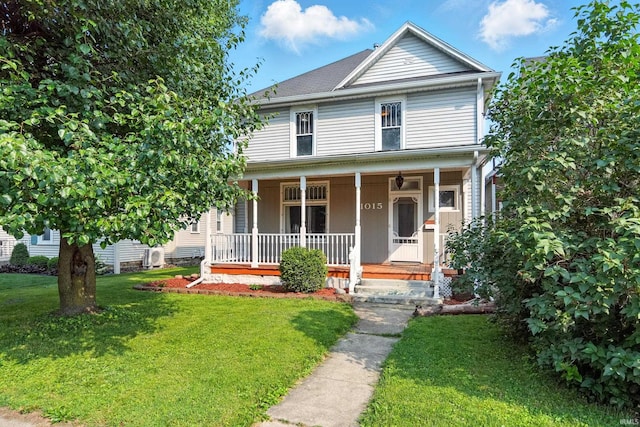 1015 Columbia Ave, Fort Wayne, IN 46805 - view of front of property featuring a porch and a front yard