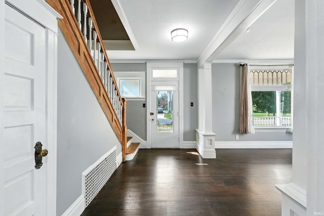 1015 Columbia Ave, Fort Wayne, IN 46805 - entrance foyer with wood finished floors, ornate columns, and stairway