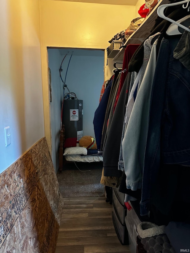 13687 E Ivan Ct, Bloomington, IN 47403 - walk in closet with wood finished floors and water heater