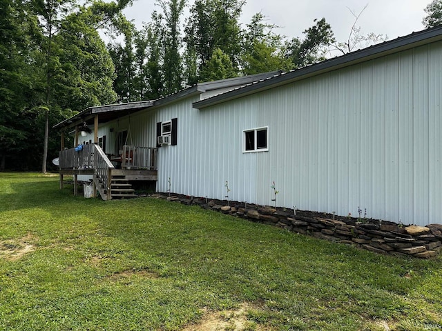 13687 E Ivan Ct, Bloomington, IN 47403 - view of property exterior featuring a yard, a deck, and a metal roof