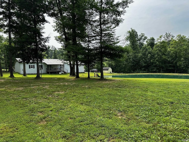 13687 E Ivan Ct, Bloomington, IN 47403 - view of green lawn with a water view