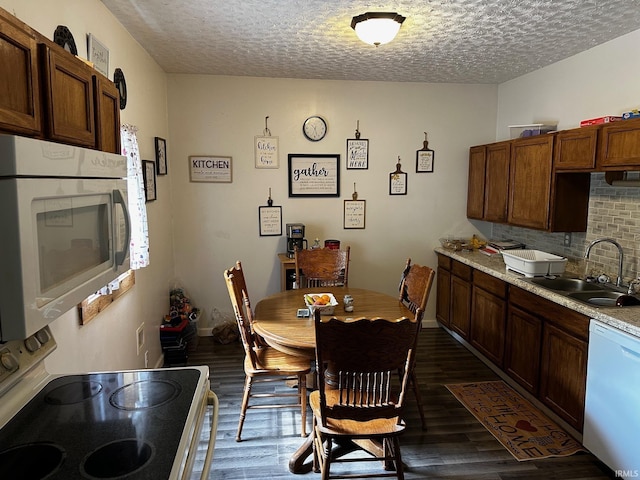 13687 E Ivan Ct, Bloomington, IN 47403 - dining room featuring wood finished floors and a textured ceiling