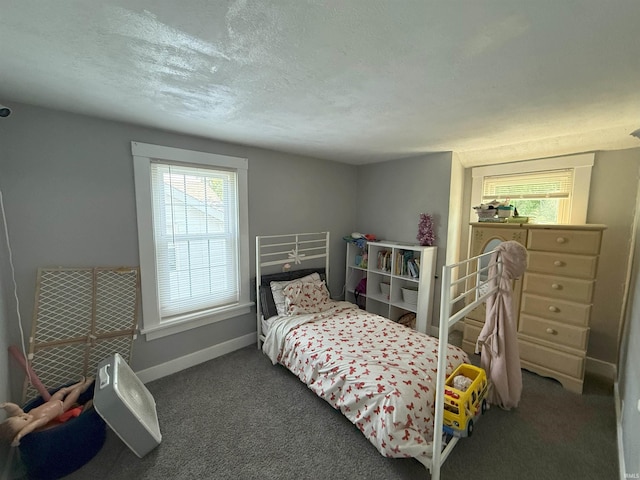 1814 S Douglas St, South Bend, IN 46613 - carpeted bedroom with baseboards and a textured ceiling