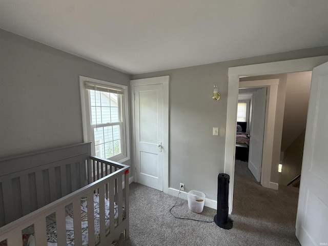 1814 S Douglas St, South Bend, IN 46613 - unfurnished bedroom featuring carpet and a nursery area