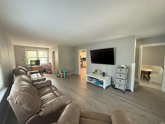 1814 S Douglas St, South Bend, IN 46613 - living area with wood finished floors and baseboards