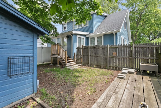 1415 S Main St, Goshen, IN 46526 - fenced backyard with a wooden deck